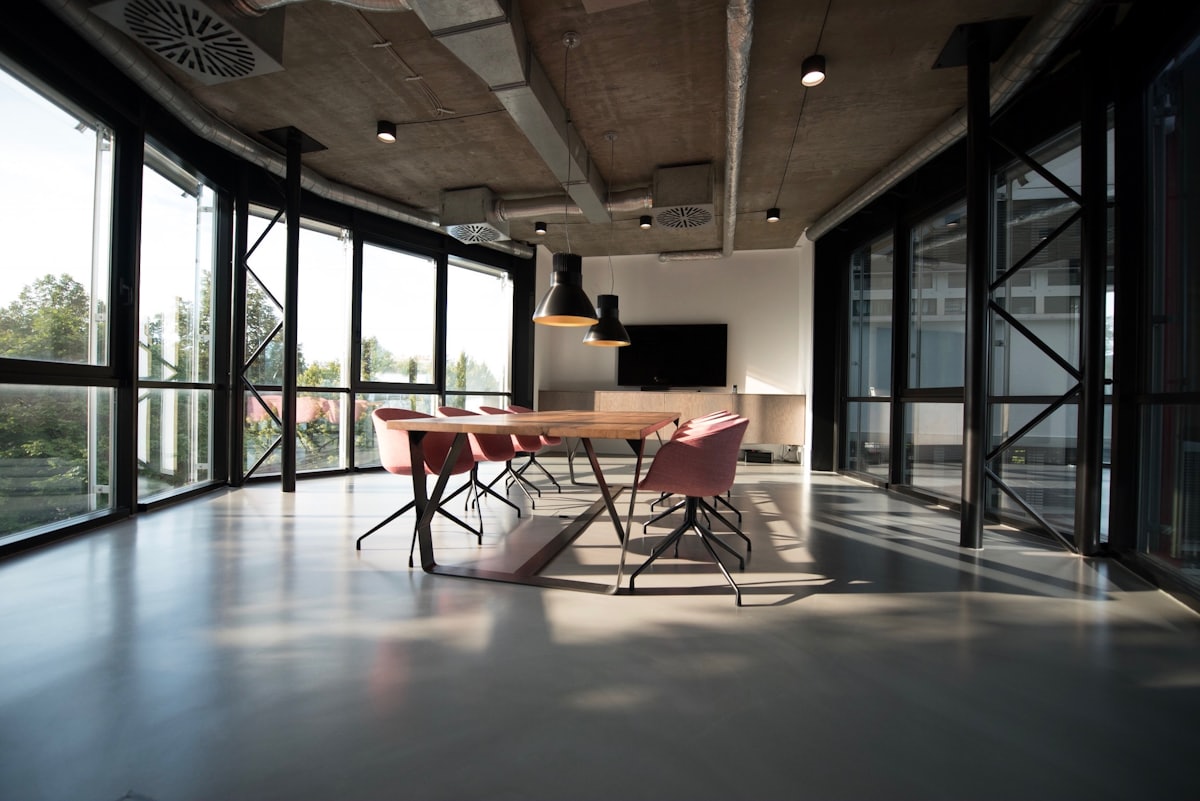 Bright office interior with wooden furniture